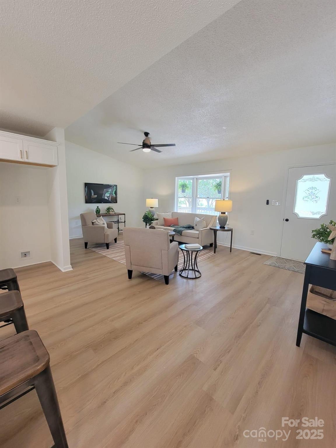 175 Pebble Drive Salisbury, NC 28147 - Photo 21 of 42 a living room with furniture and a large window