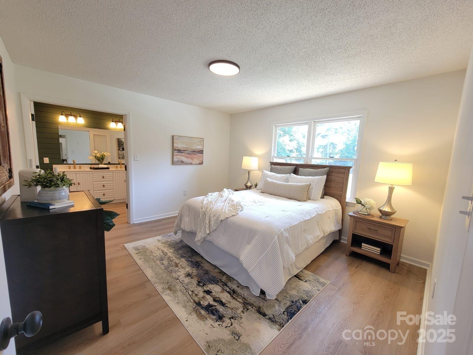 175 Pebble Drive Salisbury, NC 28147 - Photo 23 of 42 a bedroom with a bed and a mirror