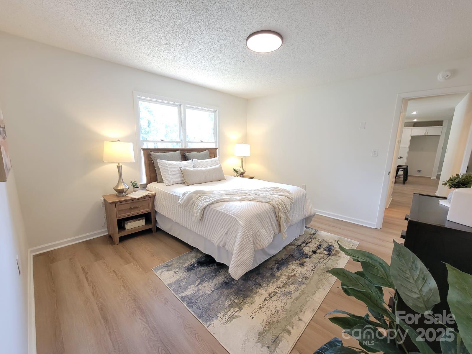 175 Pebble Drive Salisbury, NC 28147 - Photo 26 of 42 a bedroom with a bed and a large window