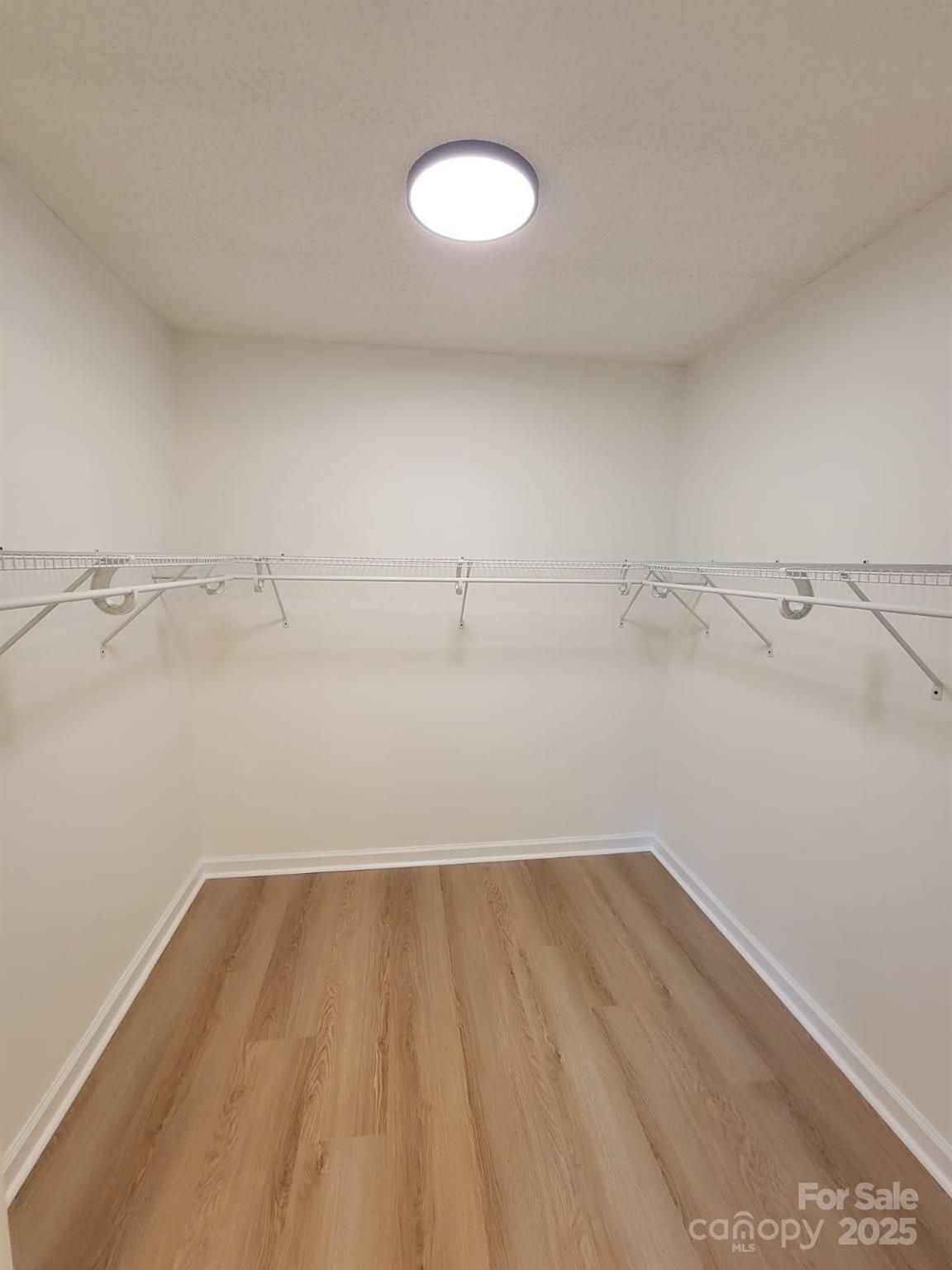 175 Pebble Drive Salisbury, NC 28147 - Photo 29 of 42 a view of a room with racks on the wall