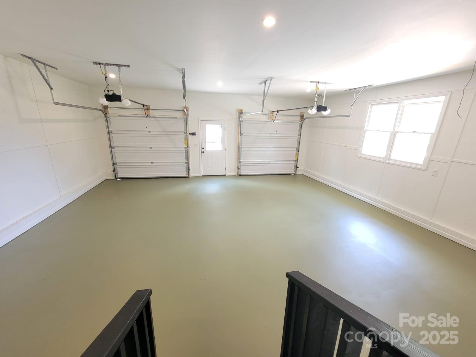 175 Pebble Drive Salisbury, NC 28147 - Photo 34 of 42 an empty room with windows and ceiling fan