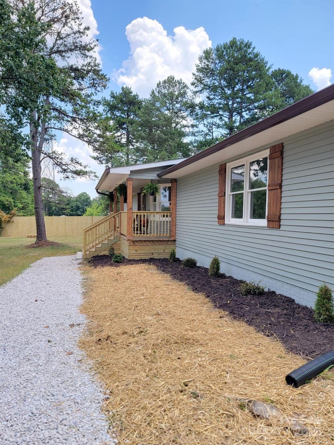 175 Pebble Drive Salisbury, NC 28147 - Photo 6 of 42 a front view of a house with a yard