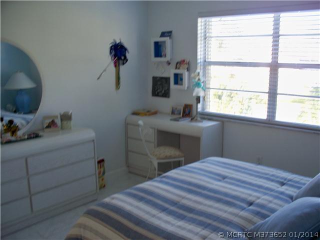 1919 Southwest Palm City Road, Unit 10J Stuart, FL 34994 - Photo 11 of 25 Master Bedroom.