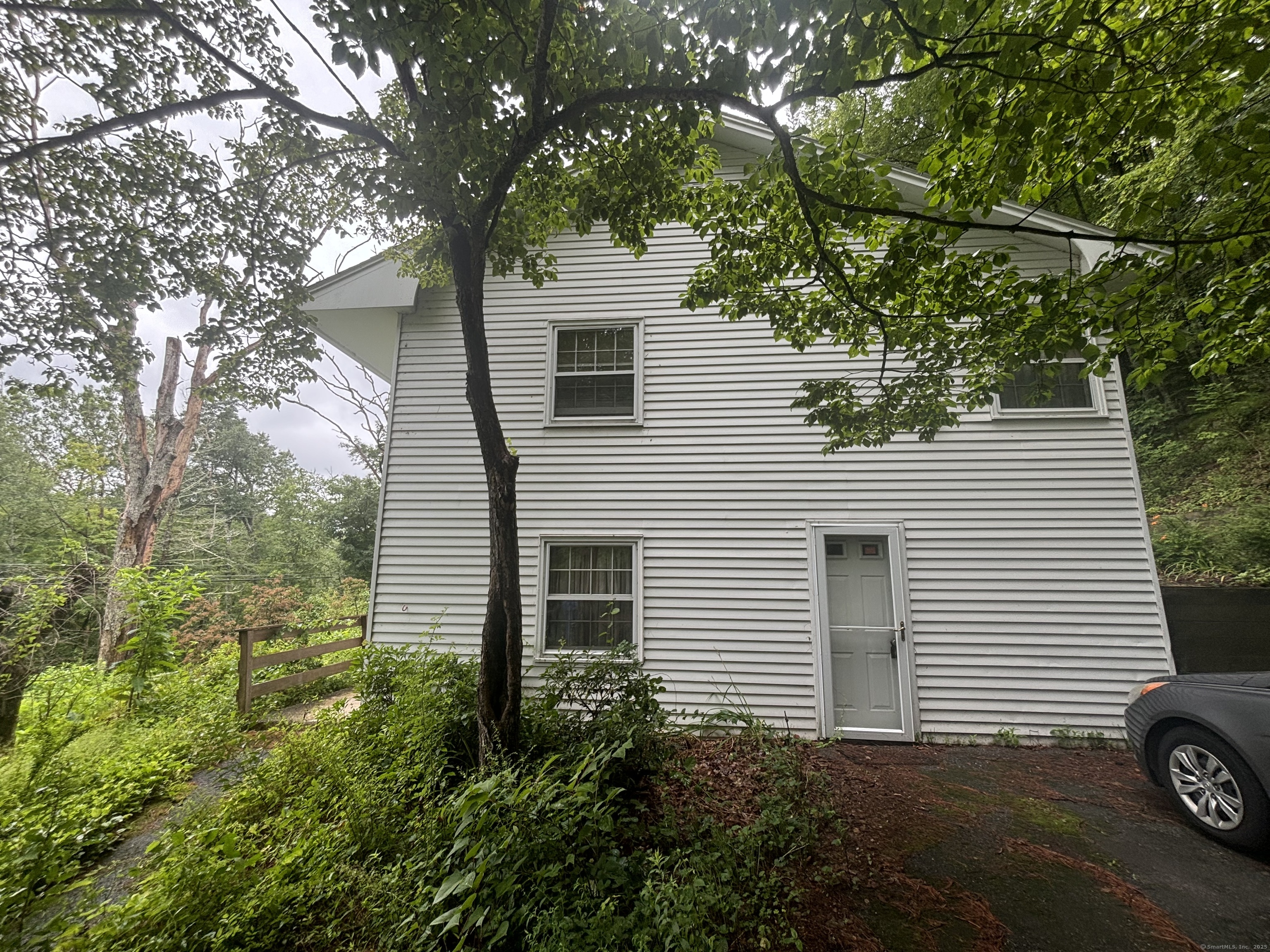 388 Chaffeeville Road Mansfield, CT 06268 - Photo 3 of 13 a view of a house with a tree