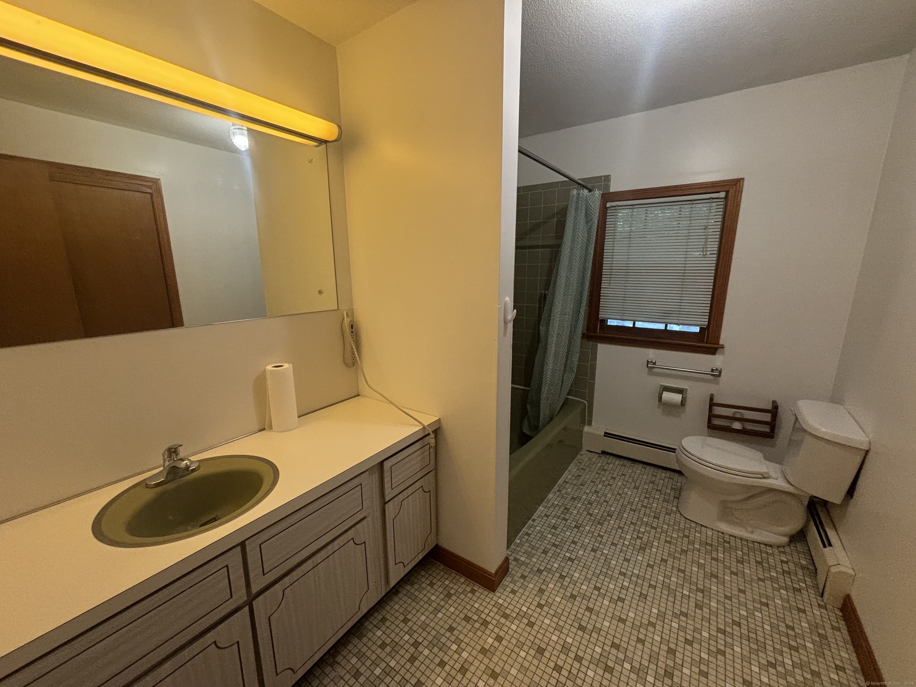 388 Chaffeeville Road Mansfield, CT 06268 - Photo 10 of 13 a bathroom with a sink and a mirror