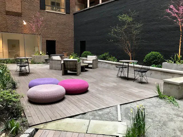 a view of a chairs and tables in the patio