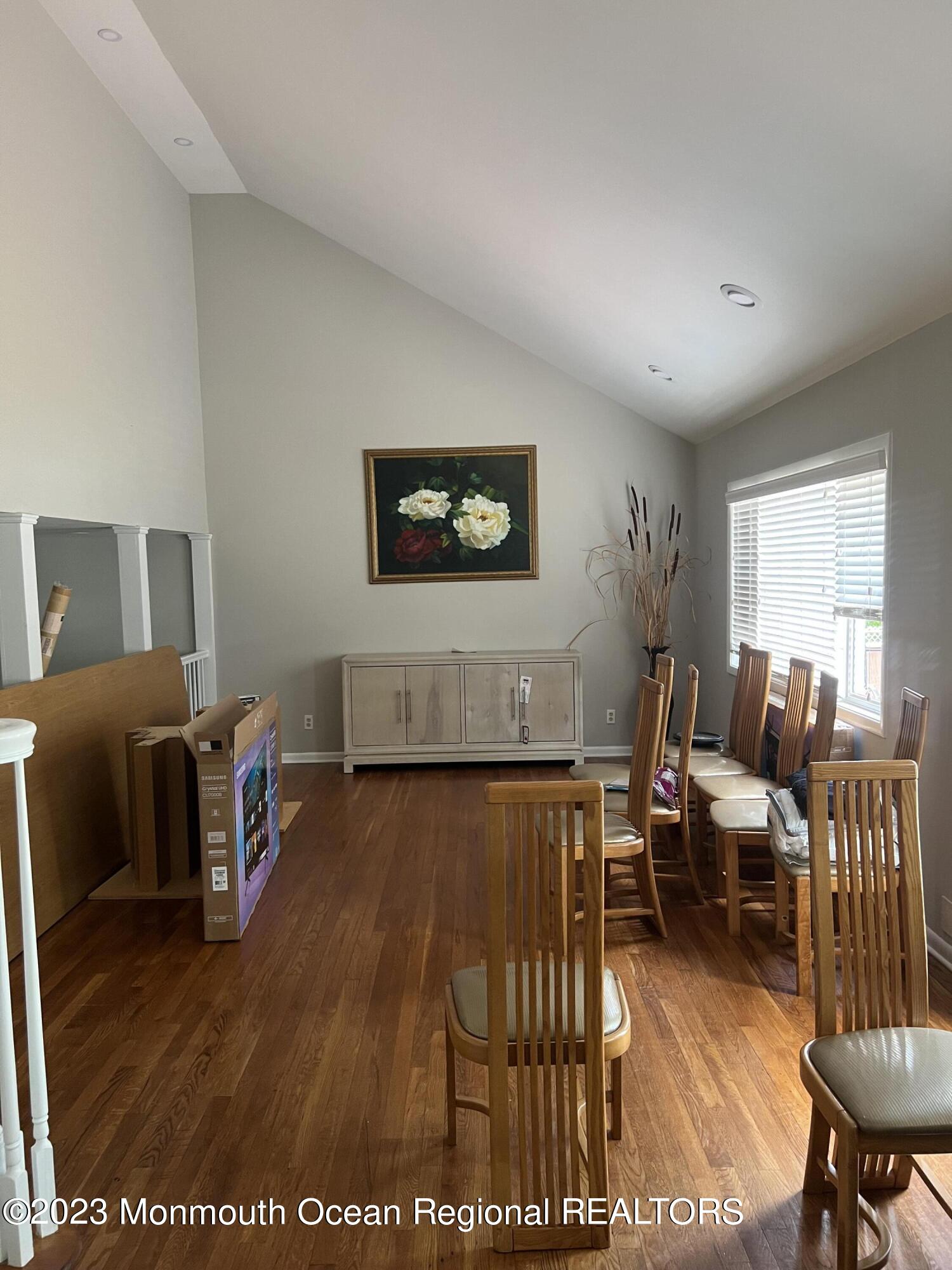 11 Barbara Lane Oakhurst, NJ 07755 - Photo 4 of 10 a living room with furniture and a flat screen tv