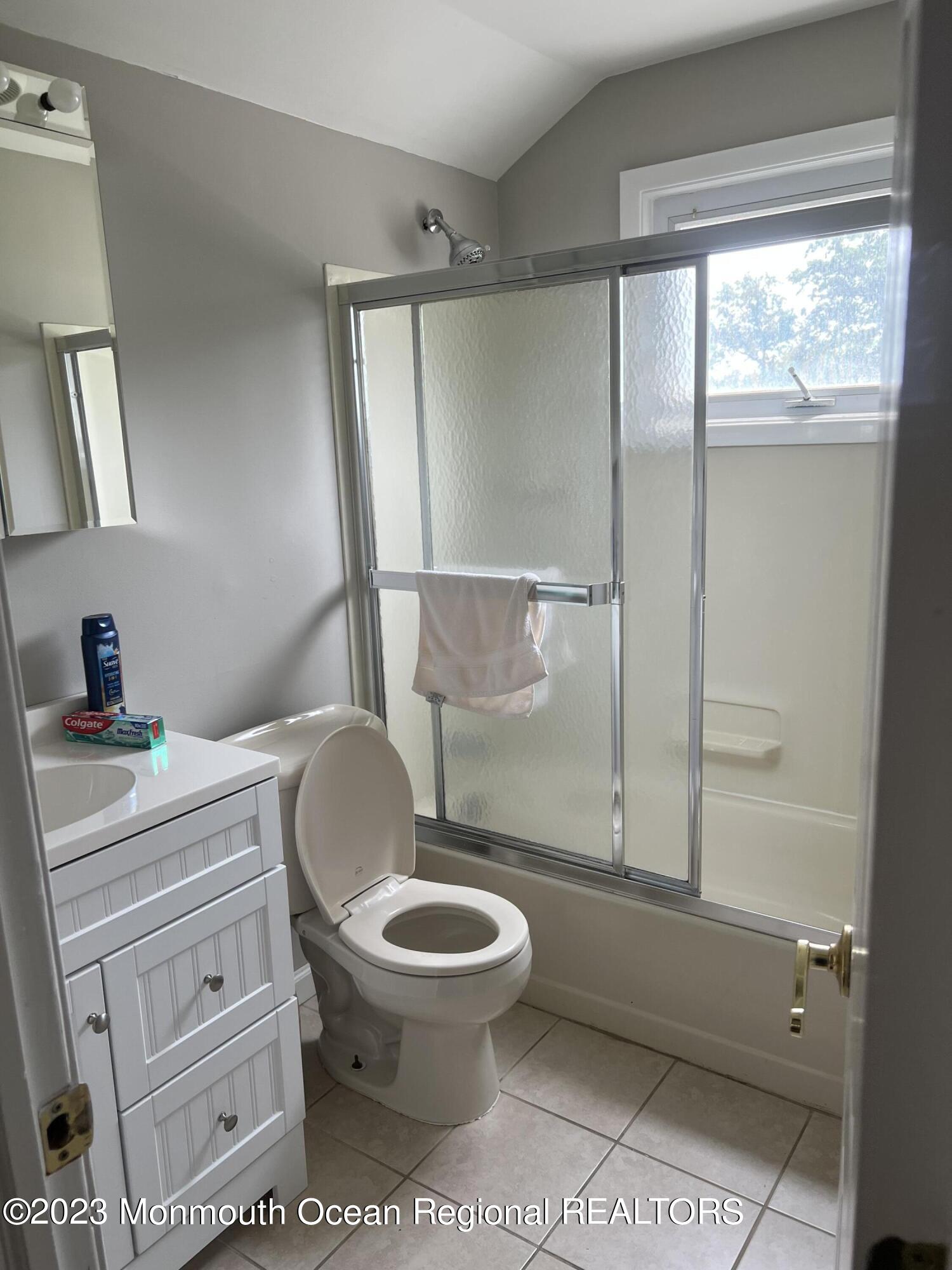 11 Barbara Lane Oakhurst, NJ 07755 - Photo 6 of 10 a bathroom with a toilet a sink and a shower