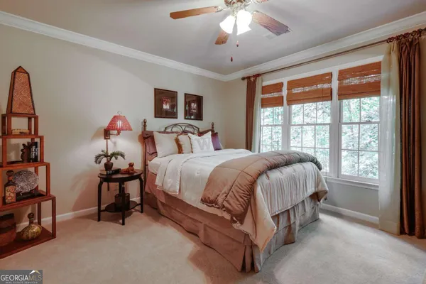 a room with furniture and gym equipment