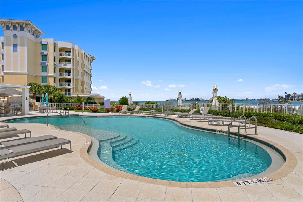 800 Collany Road, Unit 303 St. Petersburg, FL 33715 - Photo 33 of 48 a view of a swimming pool and a terrace