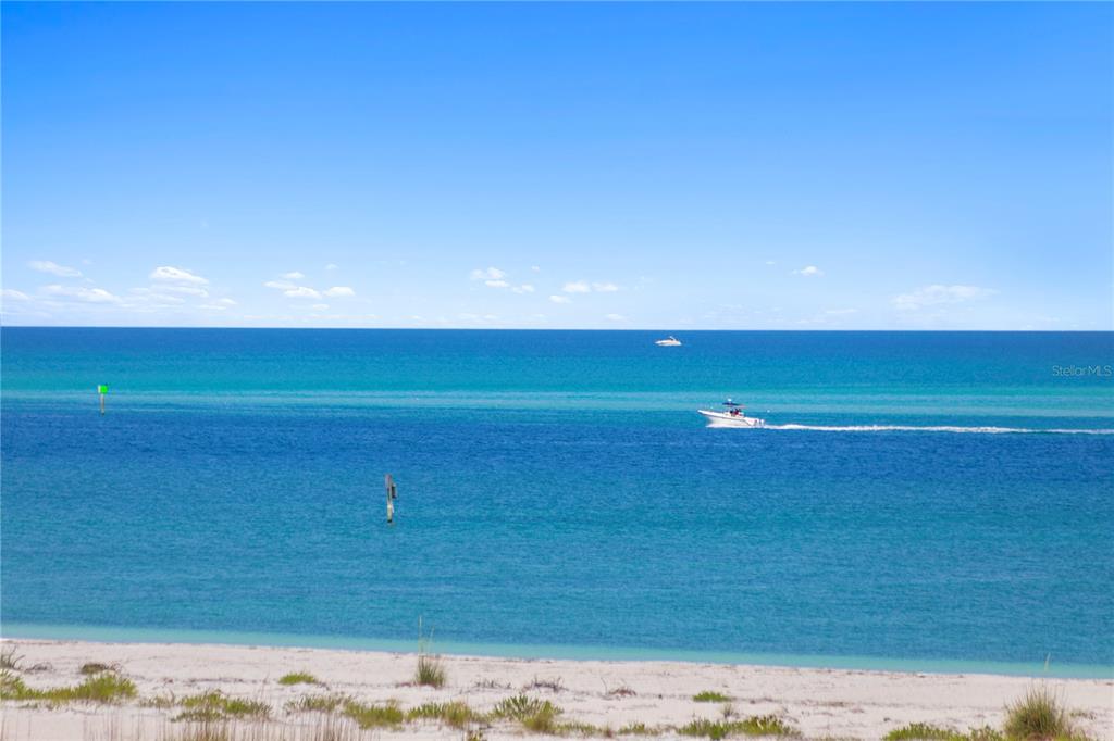 800 Collany Road, Unit 303 St. Petersburg, FL 33715 - Photo 7 of 48 a view of an ocean beach