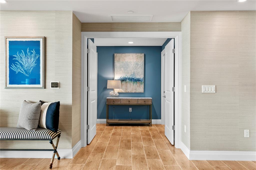 800 Collany Road, Unit 303 St. Petersburg, FL 33715 - Photo 9 of 48 a living room with furniture and a window