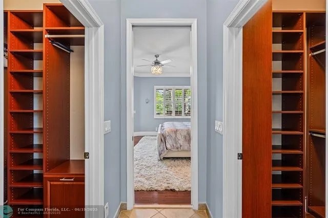 a spacious bathroom with a tub sink and mirror