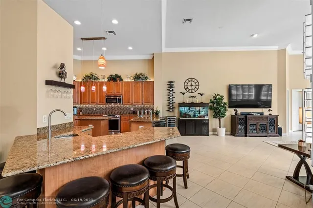 a room with lots of chairs and mirrors