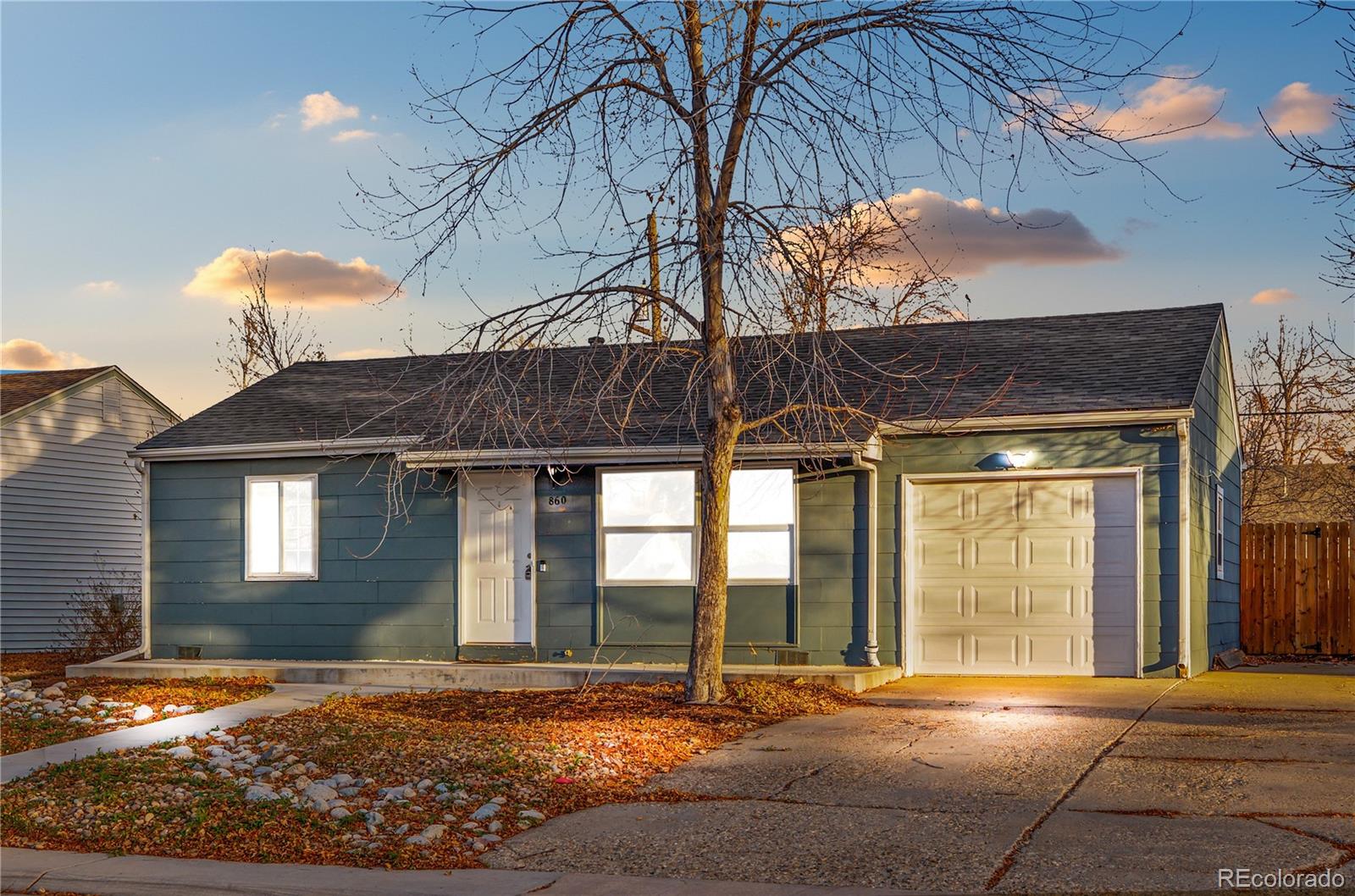 860 Lansing Street Aurora, CO 80010 - Photo 29 of 31 a view of a house with a patio