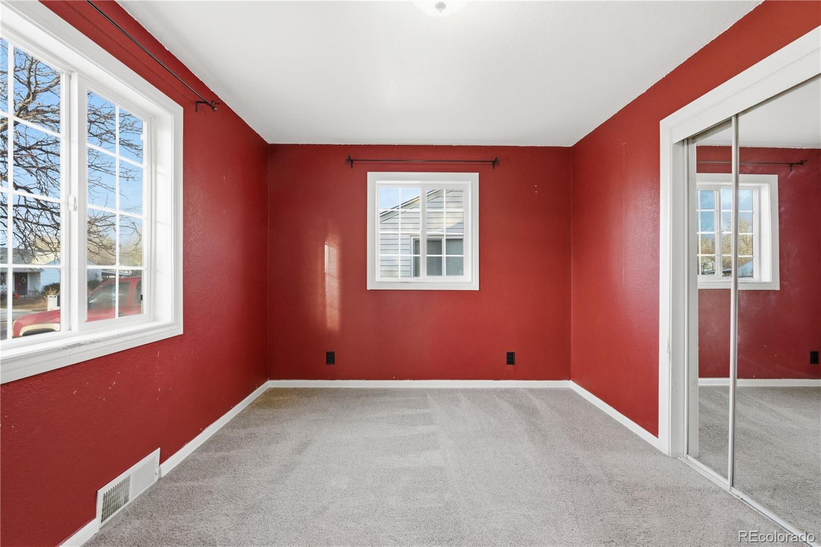860 Lansing Street Aurora, CO 80010 - Photo 10 of 31 a view of an empty room with a window