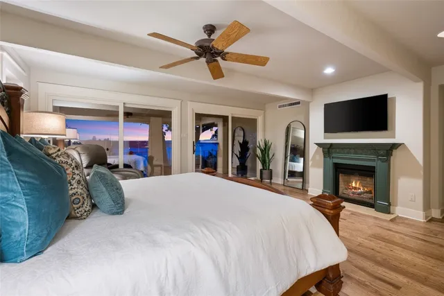 a bed room with a bed and a television