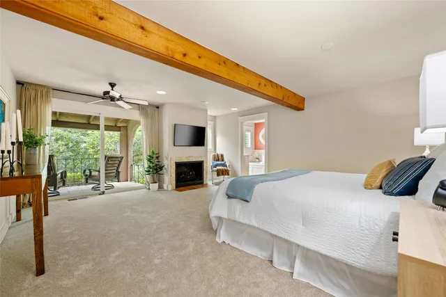 a bed room with a bed and a fireplace