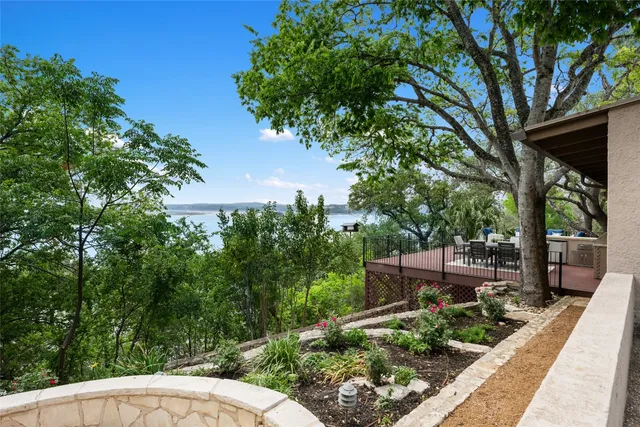 a backyard of a house with lots of green space