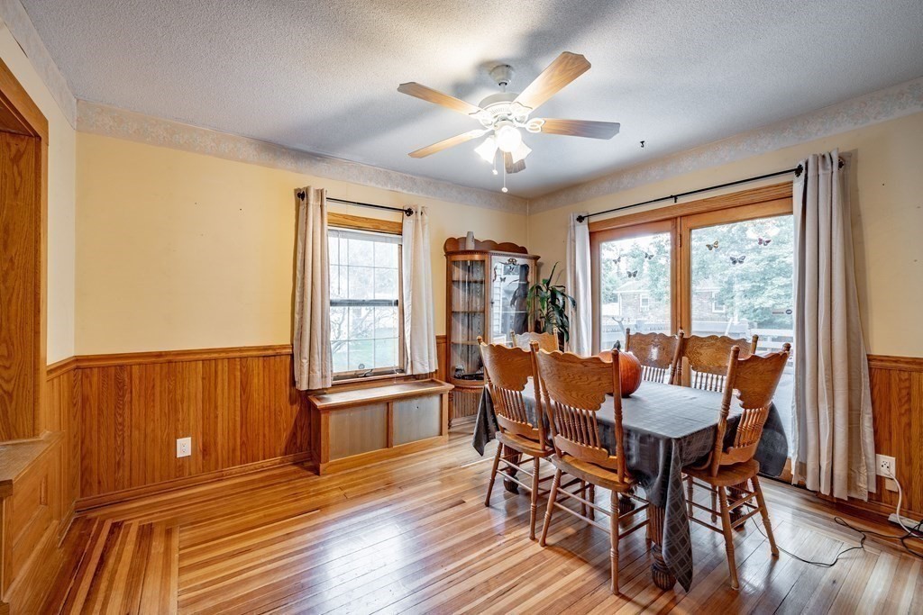 143 Gilbert Avenue Springfield, MA 01119 - Photo 16 of 37 a dining room with furniture window wooden floor