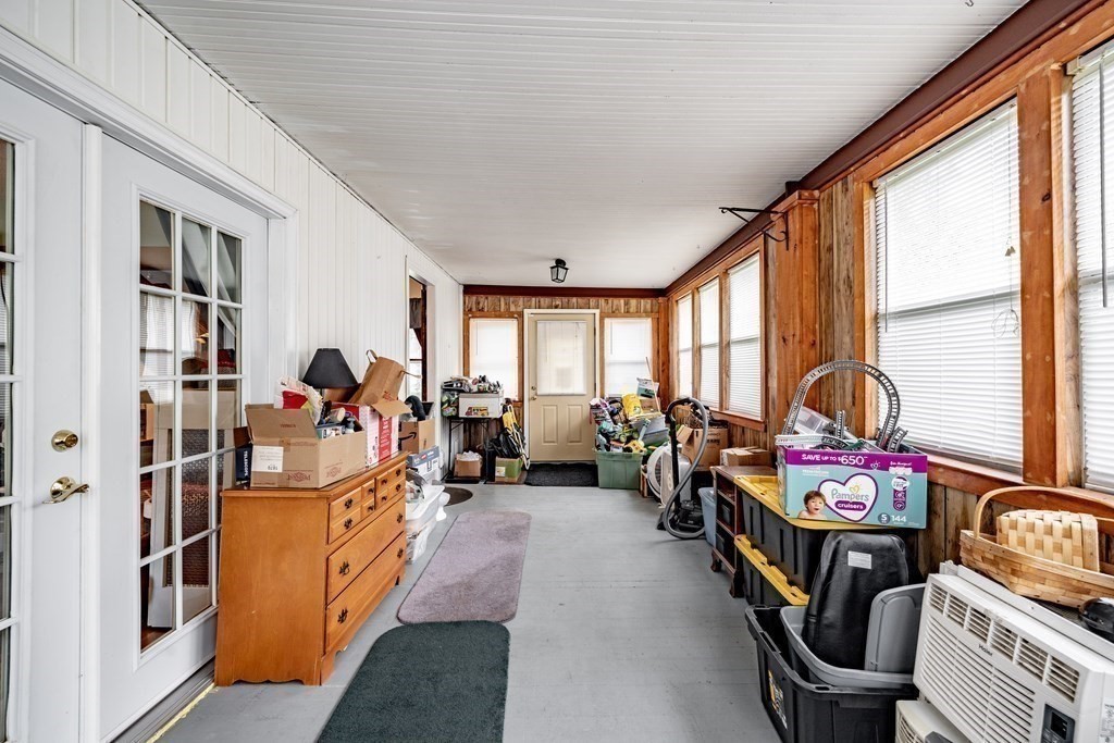 143 Gilbert Avenue Springfield, MA 01119 - Photo 18 of 37 a very nice looking room with many windows and furniture