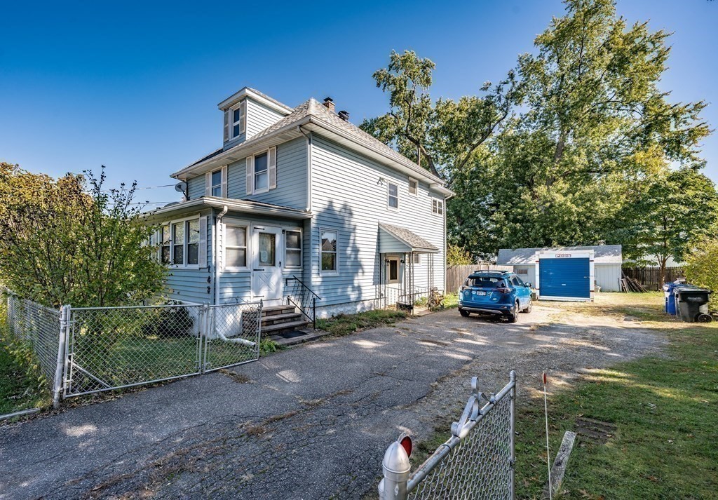 143 Gilbert Avenue Springfield, MA 01119 - Photo 3 of 37 a view of a house with a patio