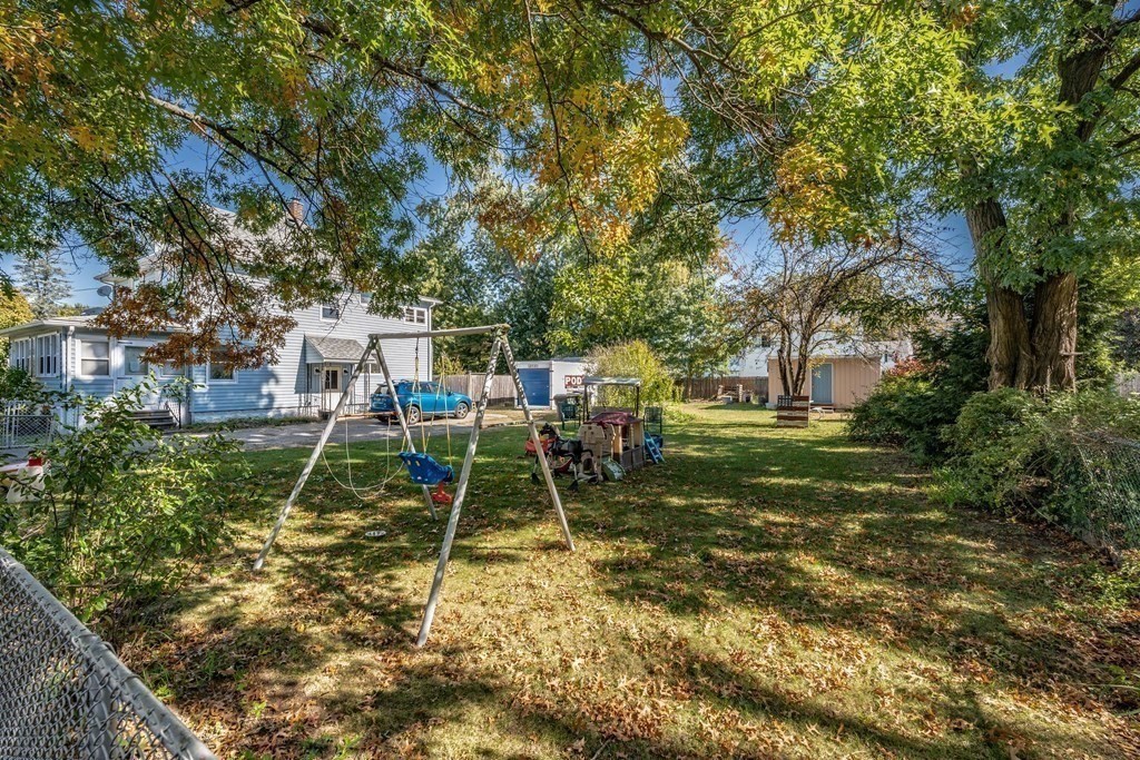 143 Gilbert Avenue Springfield, MA 01119 - Photo 33 of 37 a house view with a play ground in front of it