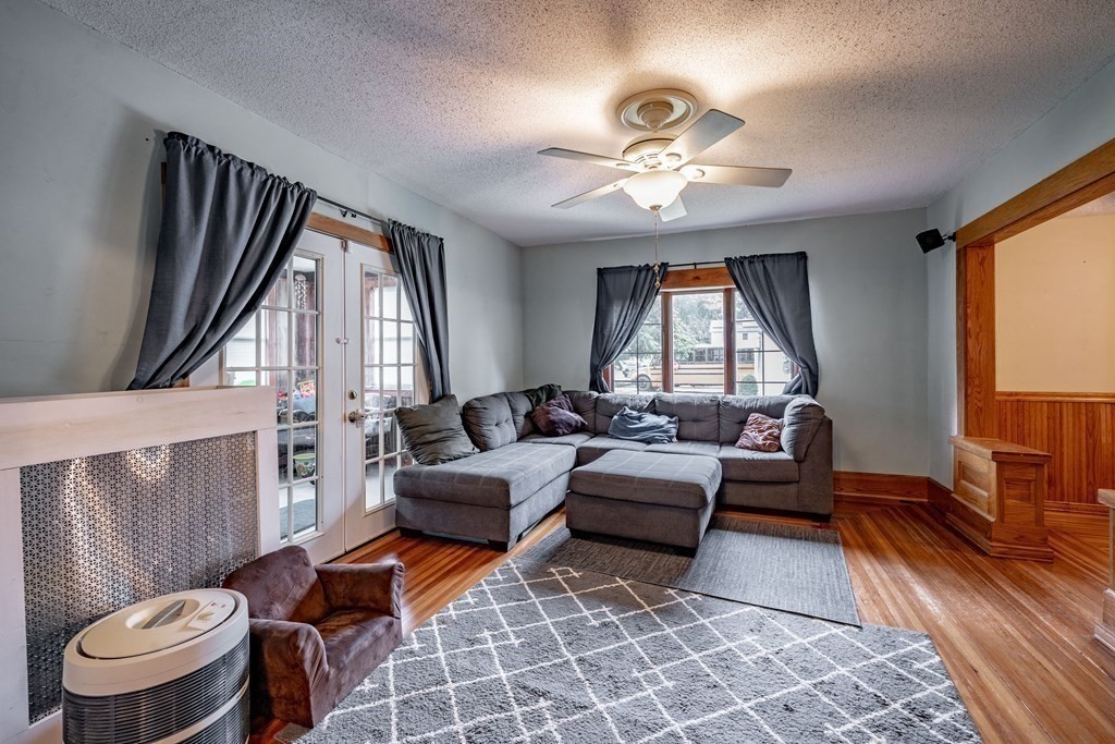 143 Gilbert Avenue Springfield, MA 01119 - Photo 8 of 37 a living room with furniture and a large window