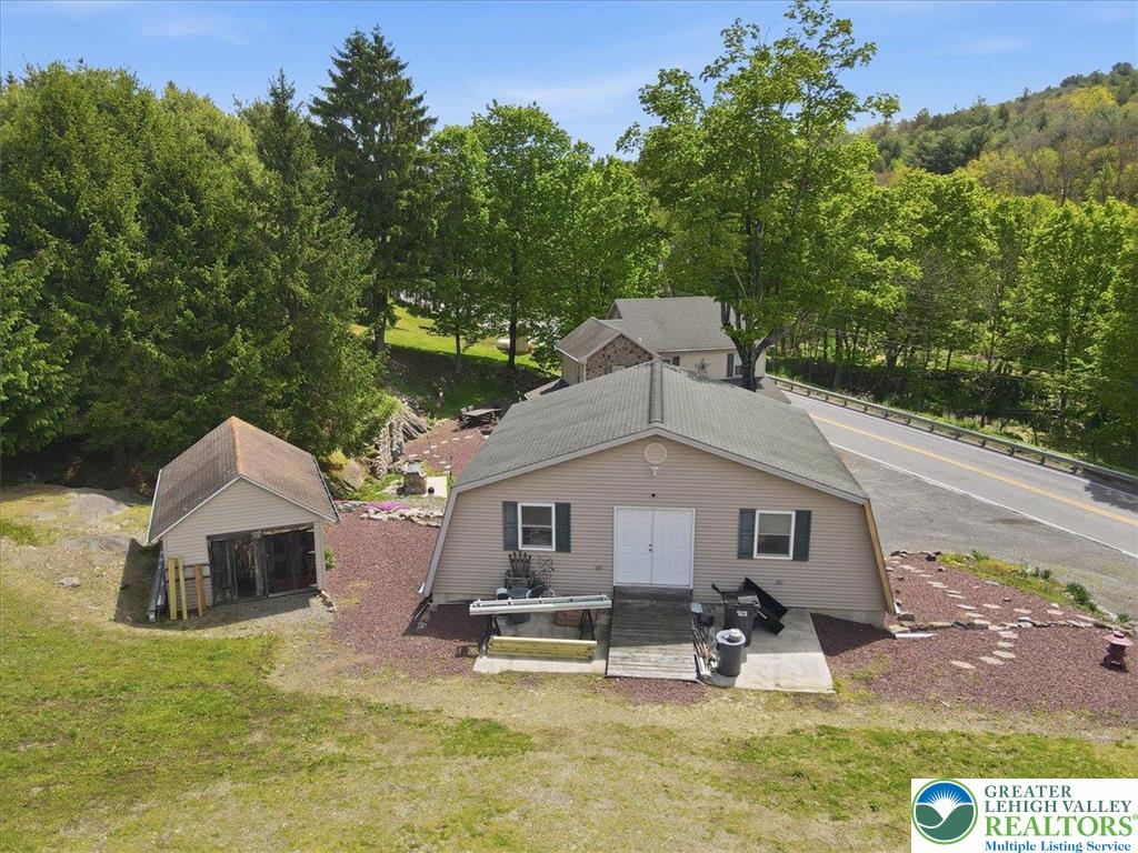 4880 Little Gap Road Kunkletown, PA 18058 - Photo 85 of 100 This charming home offers a serene escape, surrounded by lush greenery and a peaceful natural setting.
