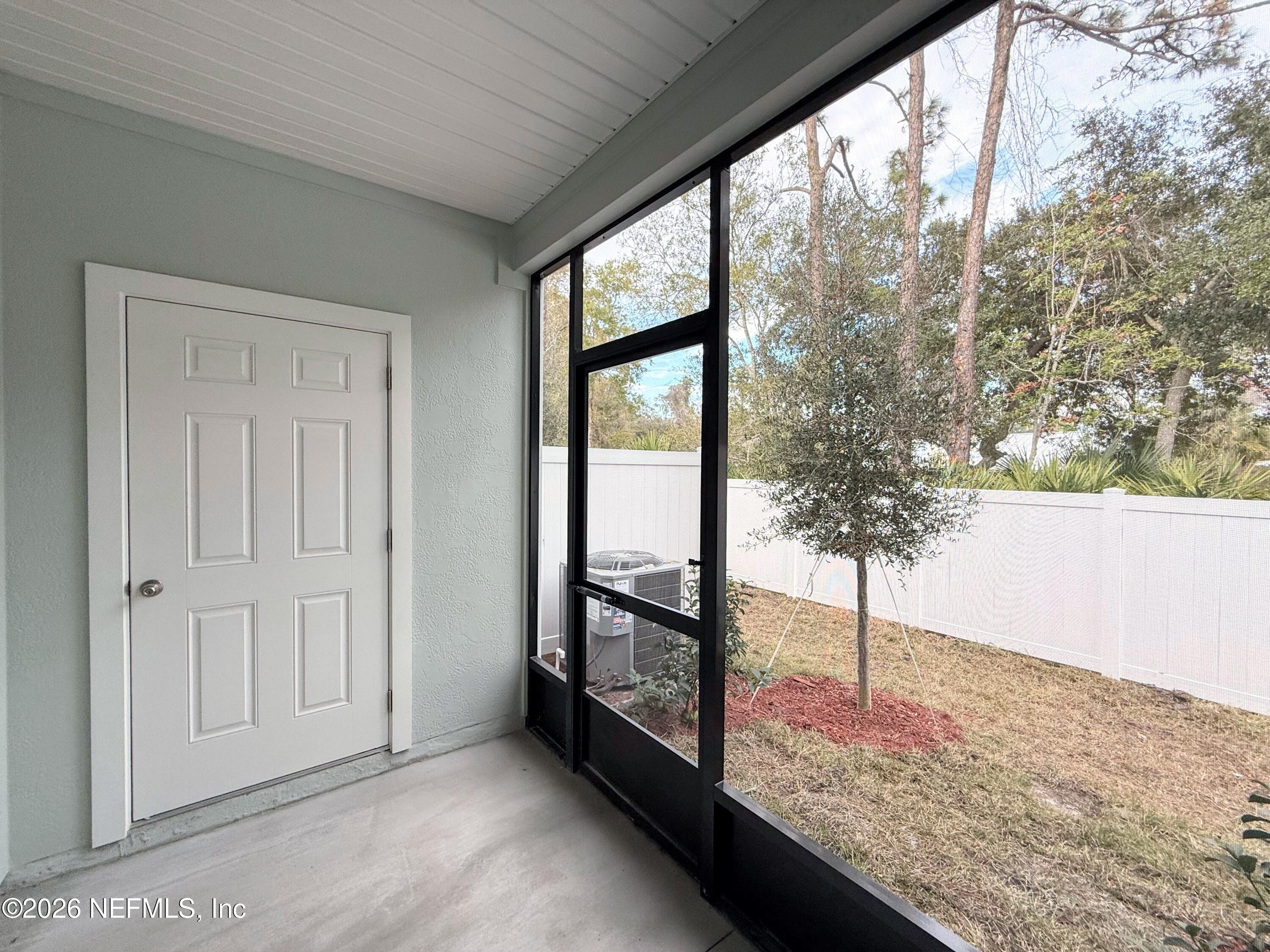 135 Palmetto Rdg Road St. Augustine, FL 32095 - Photo 9 of 19 a view of an empty room and window
