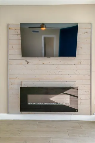 a living room with fireplace