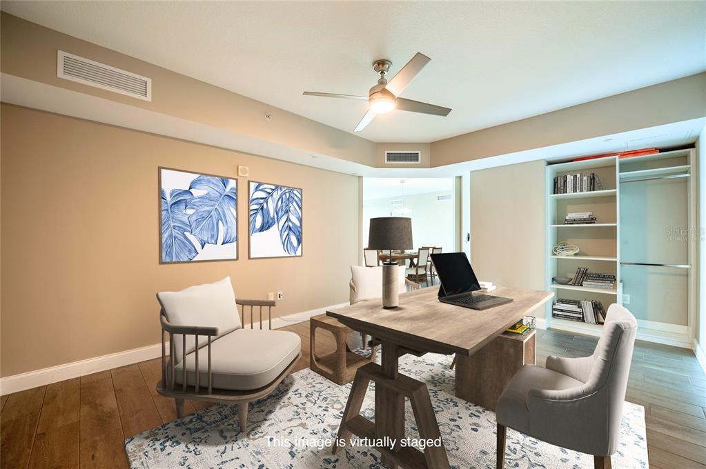 231 Riverside Drive, Unit 1703 Holly Hill, FL 32117 - Photo 15 of 41 a work room with furniture and view of kitchen