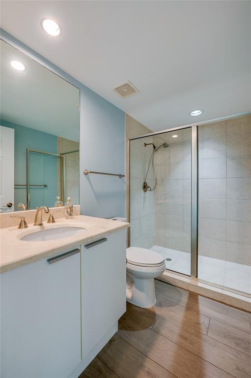 231 Riverside Drive, Unit 1703 Holly Hill, FL 32117 - Photo 16 of 41 a bathroom with a sink and a mirror