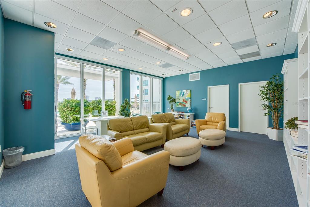 231 Riverside Drive, Unit 1703 Holly Hill, FL 32117 - Photo 33 of 41 a living room with furniture and a large window