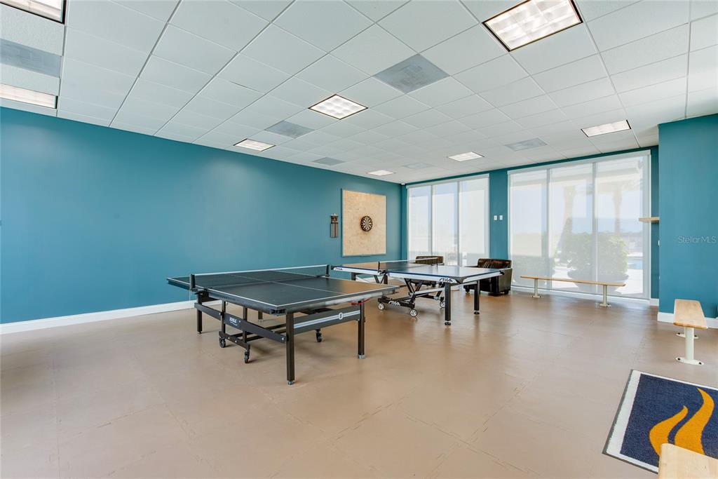 231 Riverside Drive, Unit 1703 Holly Hill, FL 32117 - Photo 34 of 41 a room with furniture pool table and couches