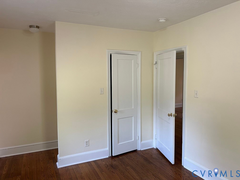 311 5th Street Blackstone, VA 23824 - Photo 3 of 6 wooden floor in an empty room