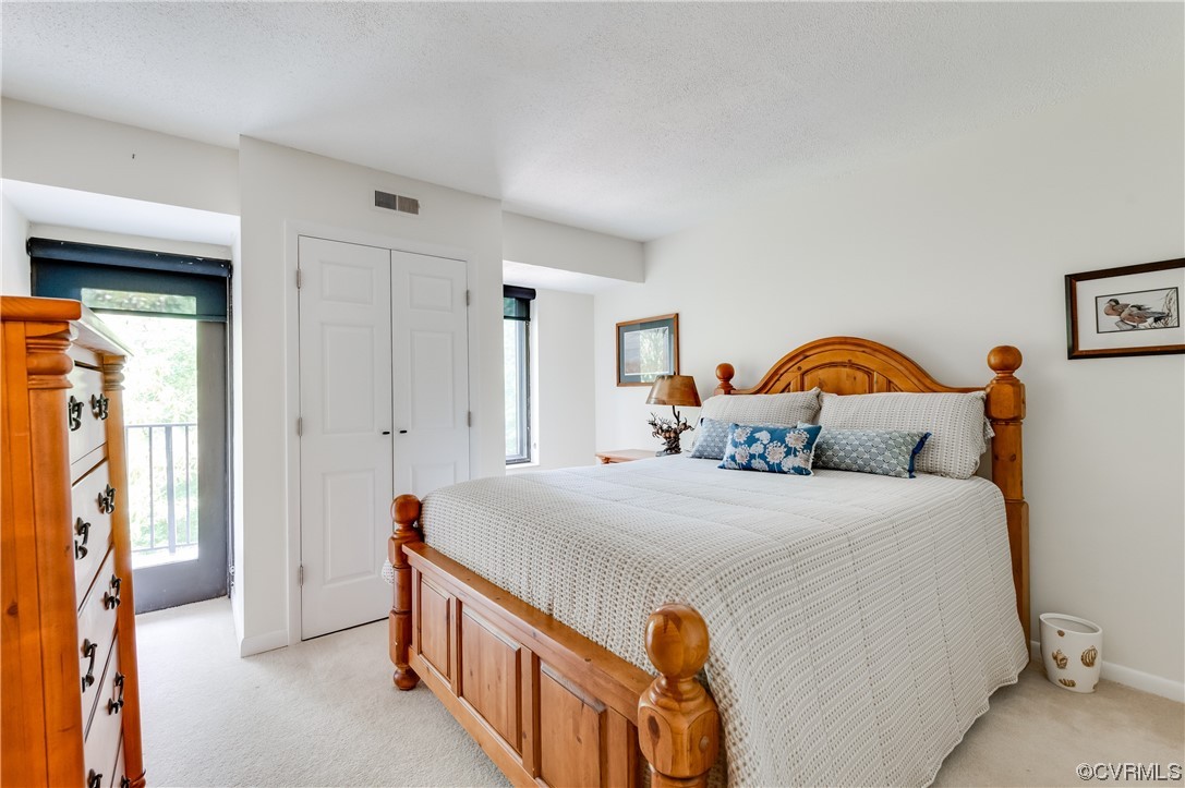 2956 Hathaway Road, Unit U306 Richmond, VA 23225 - Photo 27 of 36 a bedroom with bed and window