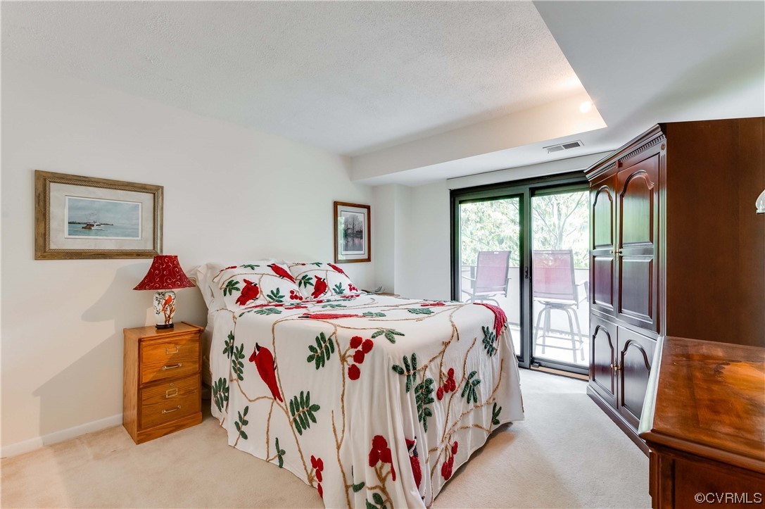 2956 Hathaway Road, Unit U306 Richmond, VA 23225 - Photo 31 of 36 a bedroom with bed and a large window