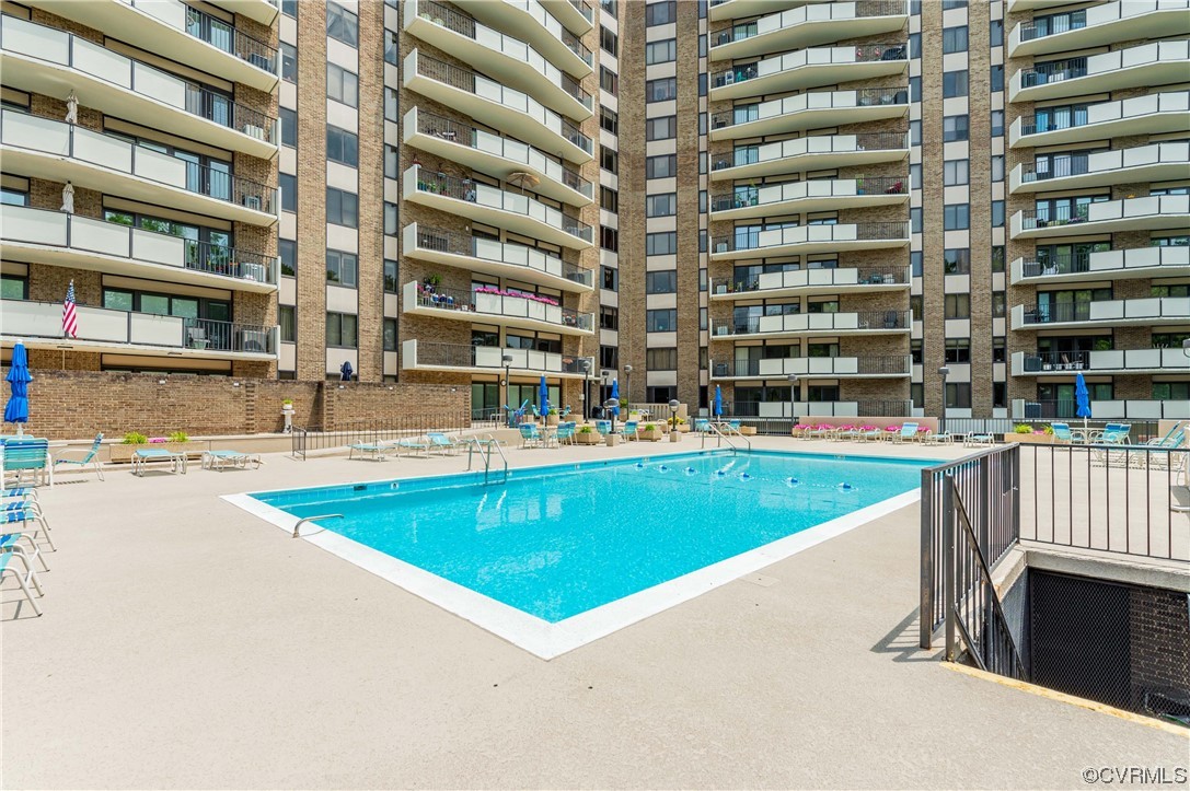 2956 Hathaway Road, Unit U306 Richmond, VA 23225 - Photo 36 of 36 a view of building with swimming pool and sitting area