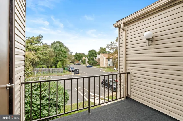 a view of a balcony with an outdoor space