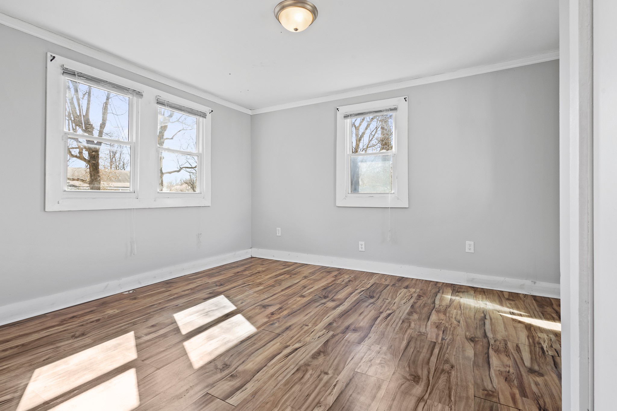 1309 Batts Boulevard Springfield, TN 37172 - Photo 11 of 20 a view of empty room with wooden floor and fan