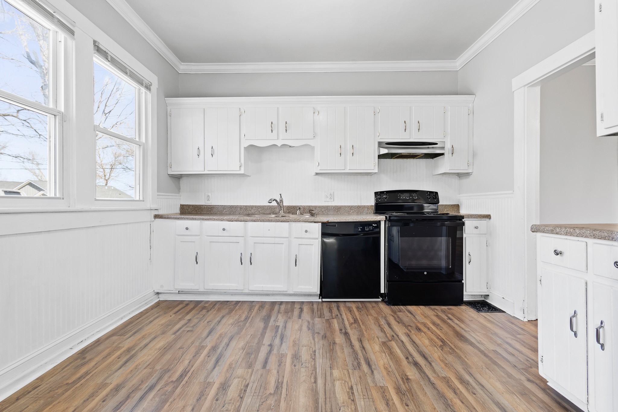 1309 Batts Boulevard Springfield, TN 37172 - Photo 16 of 20 a kitchen with stainless steel appliances granite countertop a stove and white cabinets