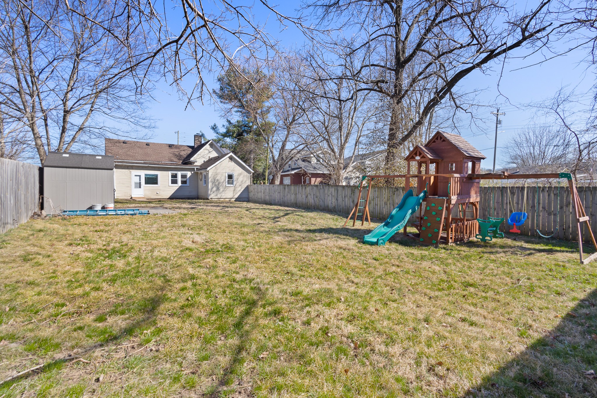 1309 Batts Boulevard Springfield, TN 37172 - Photo 19 of 20 a house with tall trees in the background