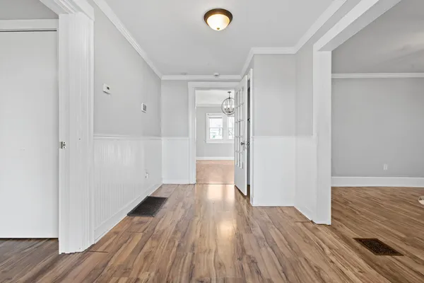 a view of livingroom with wooden floor