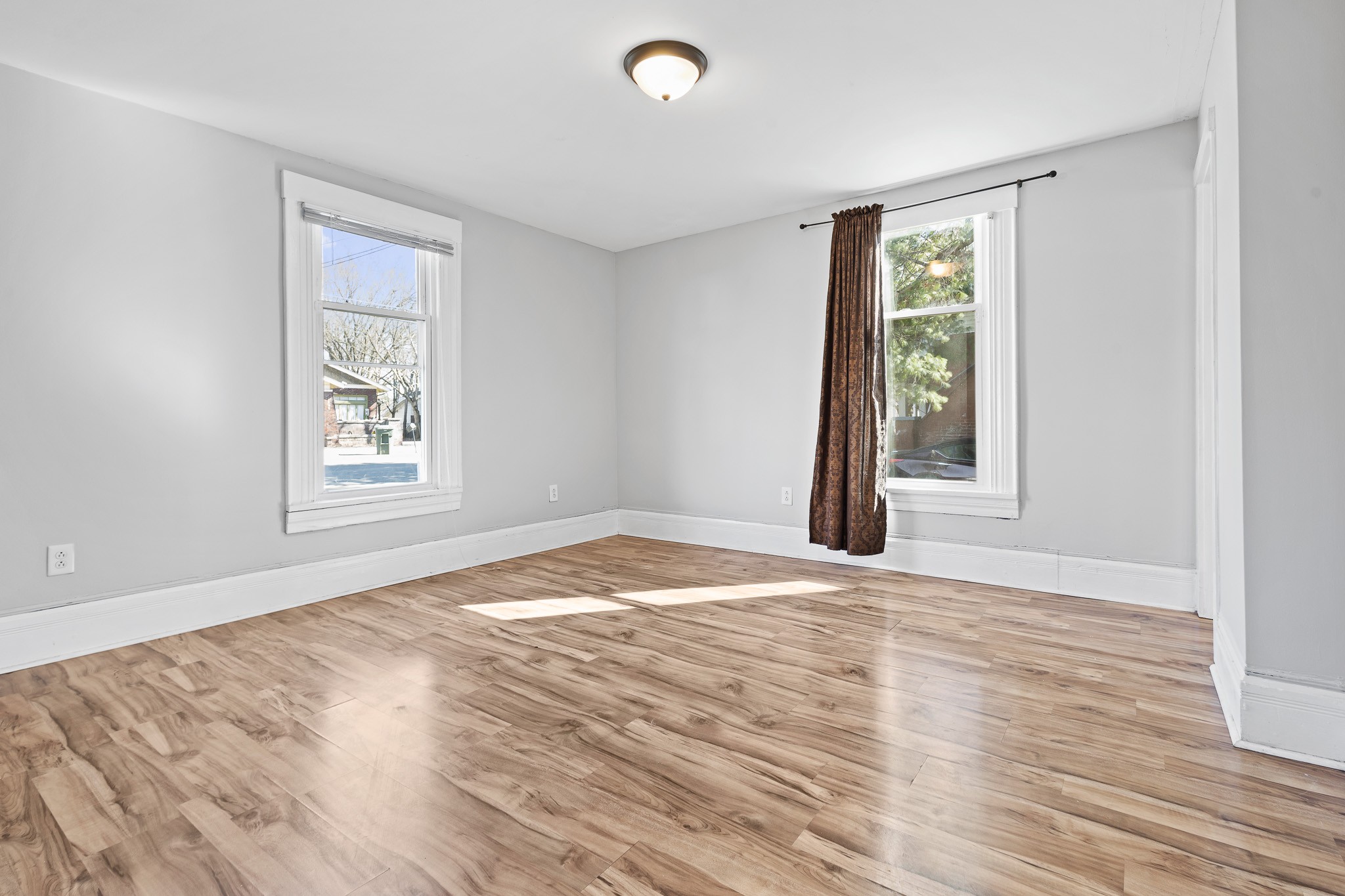 1309 Batts Boulevard Springfield, TN 37172 - Photo 6 of 20 a view of empty room with wooden floor and fan