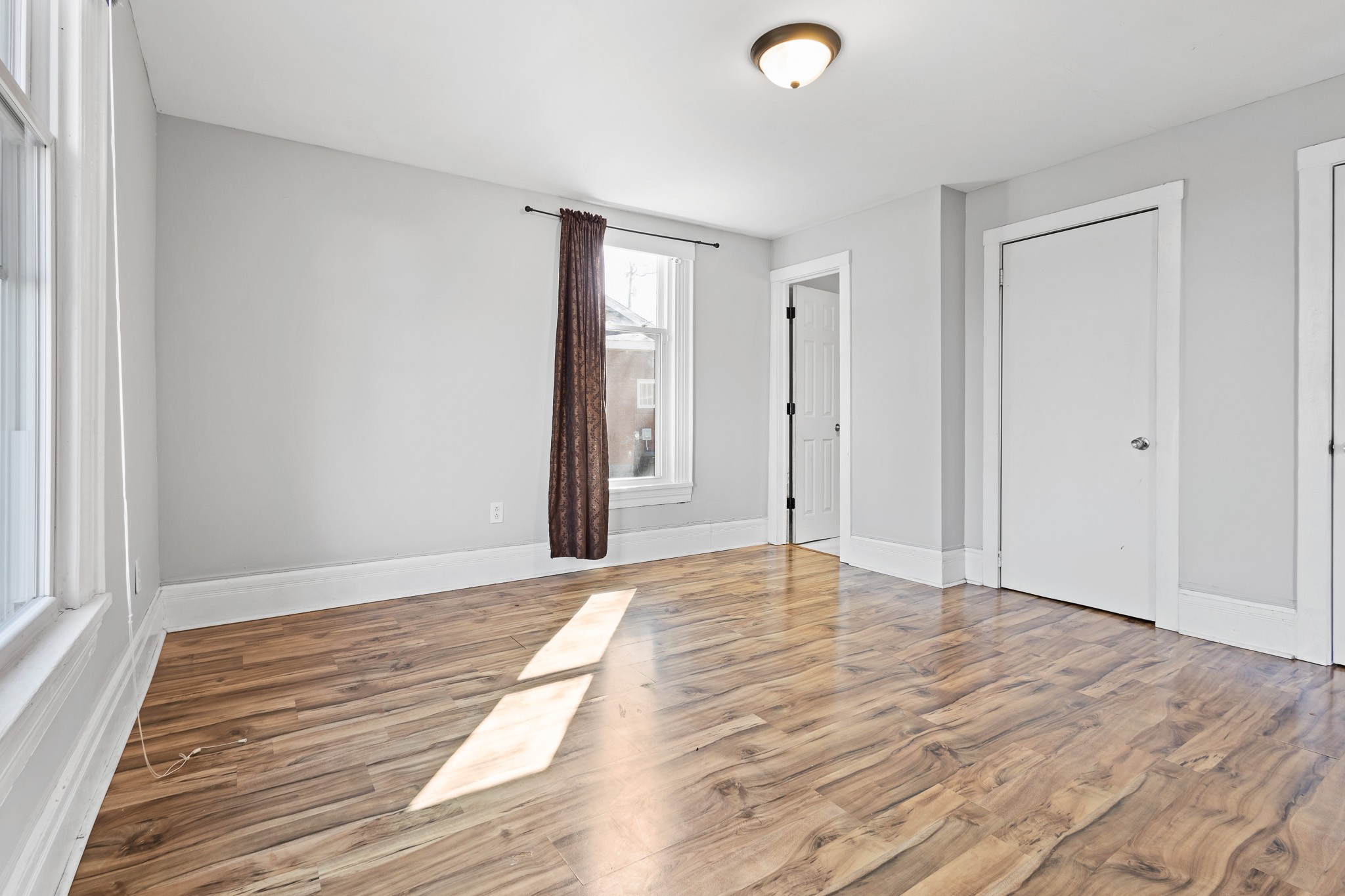 1309 Batts Boulevard Springfield, TN 37172 - Photo 7 of 20 a view of an empty room and wooden floor