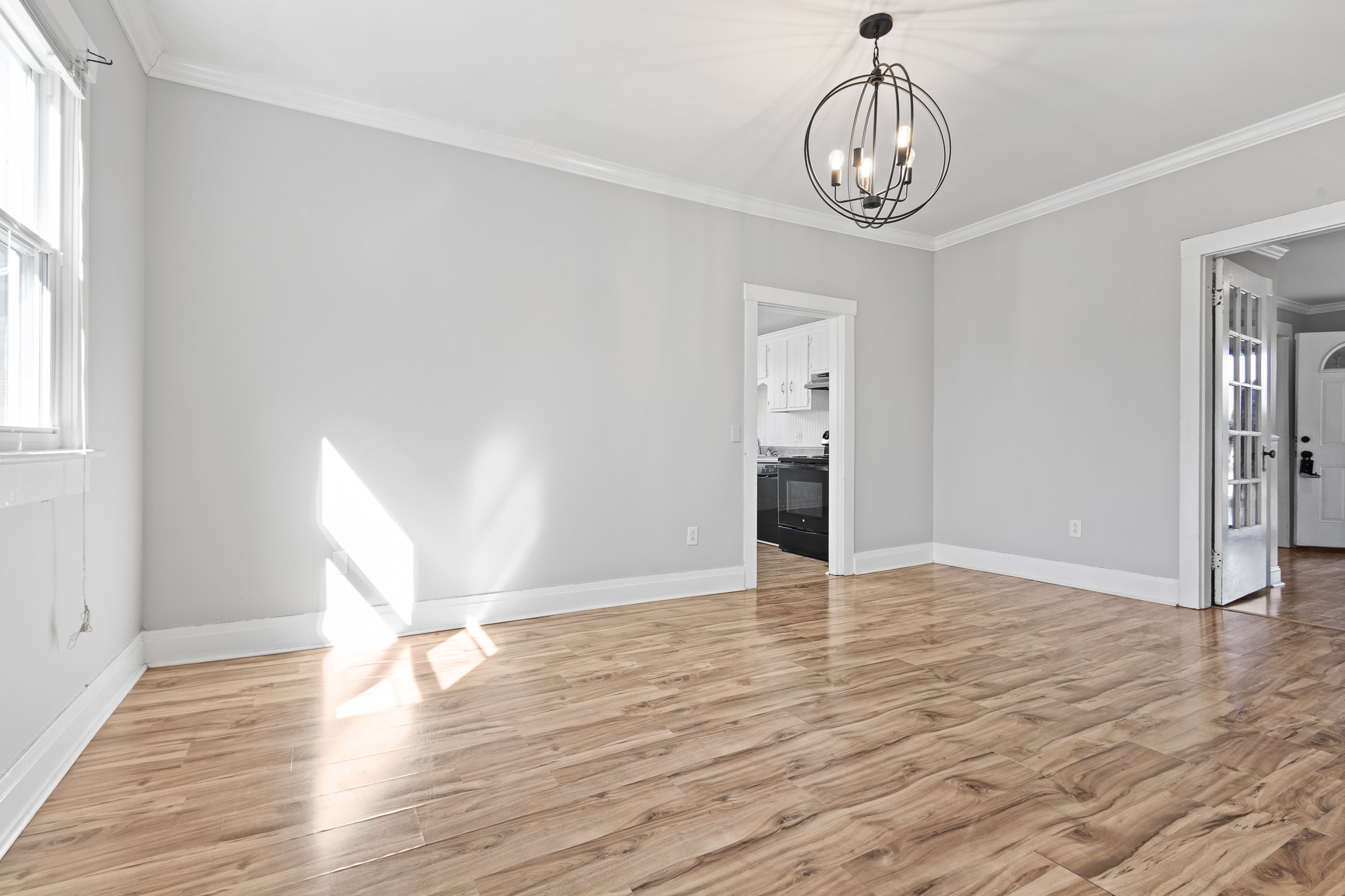 1309 Batts Boulevard Springfield, TN 37172 - Photo 9 of 20 a view of empty room with wooden floor and window