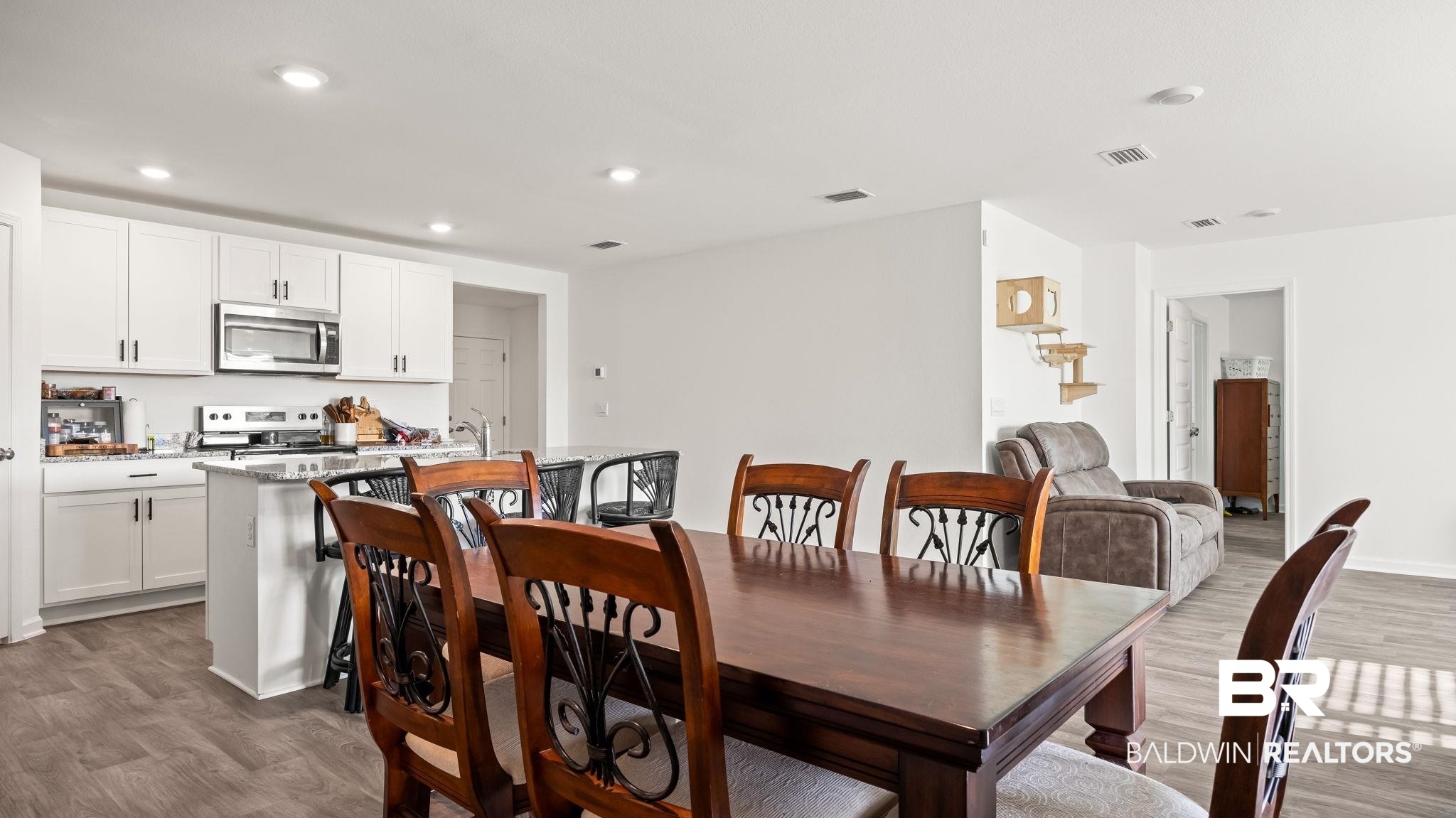 24264 Veranda Circle Elberta, AL 36530 - Photo 28 of 41 Dining room with dark wood-style floors and recessed lighting