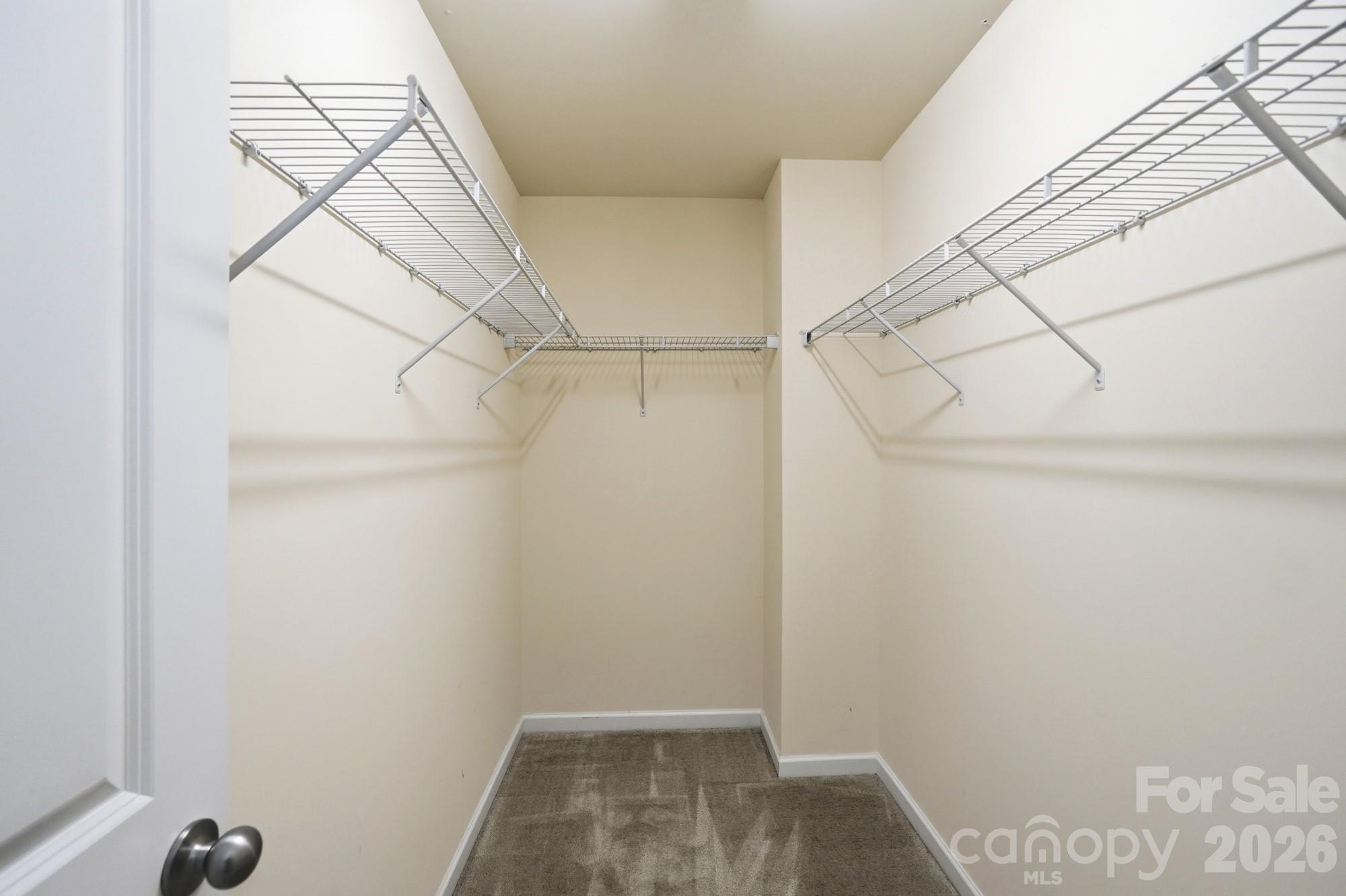 175 Limerick Road, Unit B Mooresville, NC 28115 - Photo 21 of 30 a view of a room with racks on the wall
