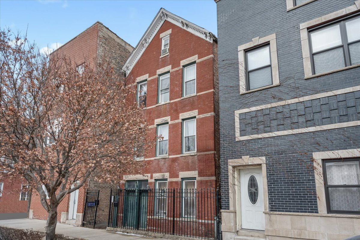 934 West 35th Place Chicago, IL 60609 - Photo 2 of 24 a view of a building next to a road